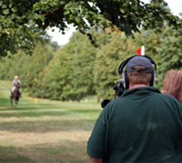 Camera man filming cross-country event