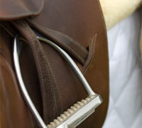The stirrups on an English saddle can take adjusting to over time