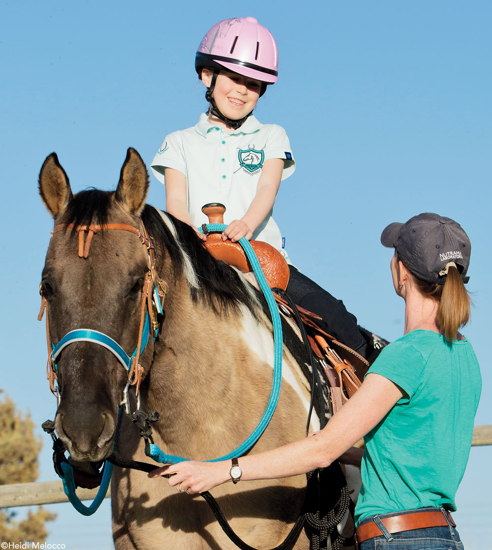 Kid Riding Horse