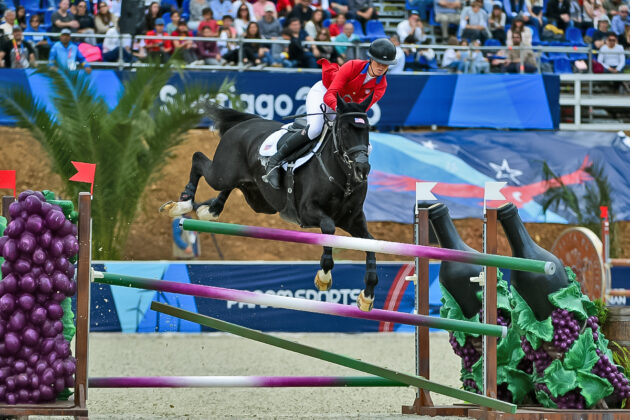 A rider and horse have a bad jump