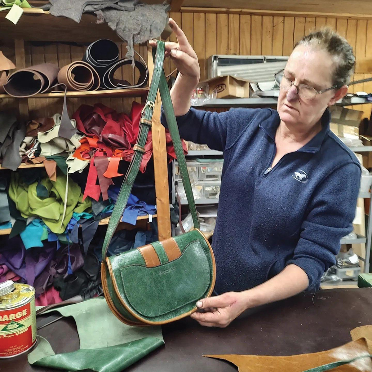 Claire Painter of Clever with Leather works on one of her unique leather purses