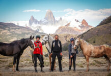Gaucho Derby winners at the finish line with a Patagonia mountain backdrop
