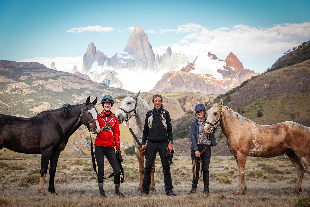 Gaucho Derby winners at the finish line with a Patagonia mountain backdrop