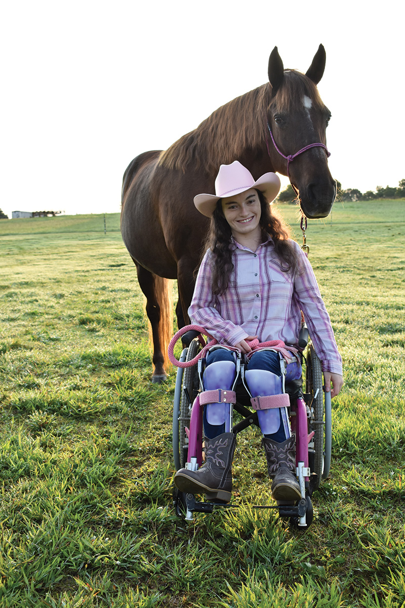 Jewell Cox with her horse. Horse ownership is a journey she's always dreamed of.