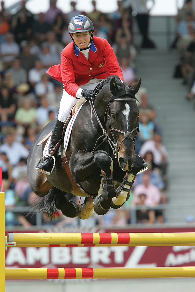 Beezie Madden jumping the KWPN (Dutch Warmblood) stallion Judgement