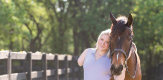A portrait of Lily Voss and her horse.