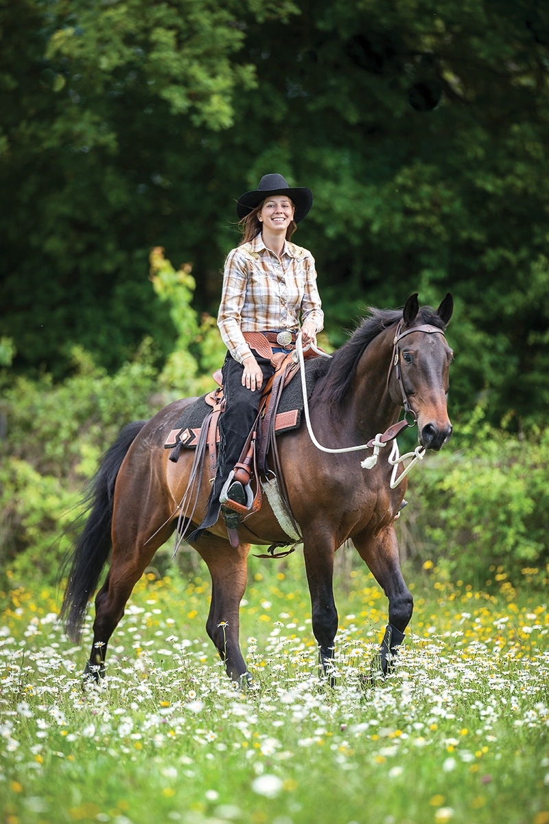 A rider on her horse. The goal of harnessing neuropsychology in equestrian sports is to enhance your enjoyment of riding.