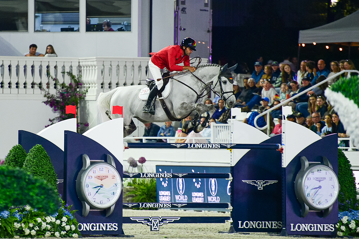 2024 Olympic gold medalists from Germany Christian Kukuk and Checker 47 clear the last fence in the 2026 Longines League of Nations™ Ocala.