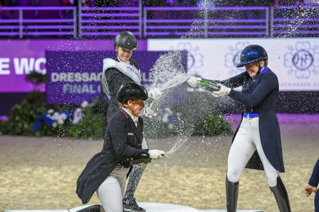 Dressage rider Isabell Werth spraying her fellow winners with champagne