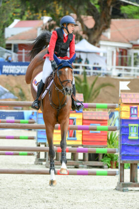 Laura Kraut and Dorado 212 show jumping at the Pan American Games