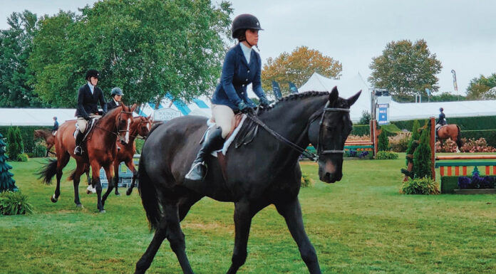 Lauren Reischer, an equestrian with a disability, competes at the Hampton Classic Horse Show