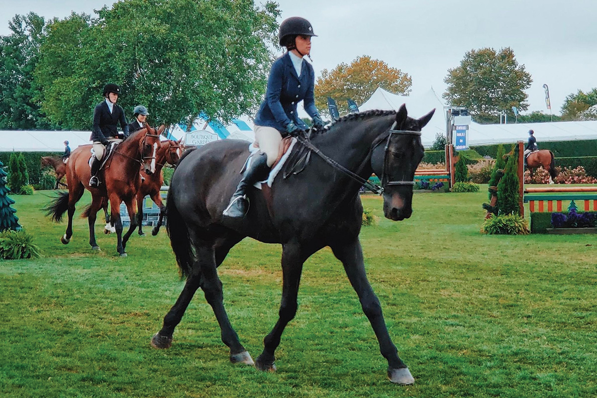 Lauren Reischer, an equestrian with a disability, competes at the Hampton Classic Horse Show