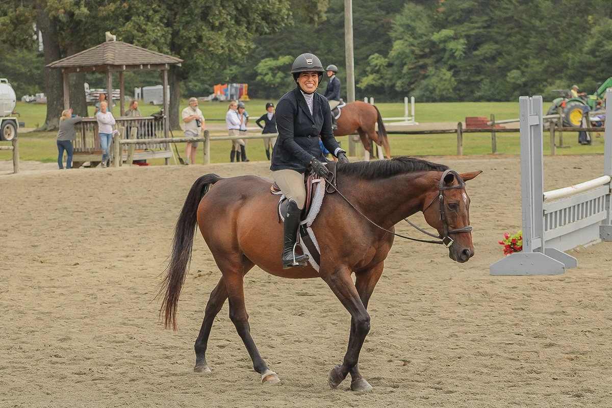 Jackie Montero-Sharpe, an equestrian who battles guilt over barn time/work balance.