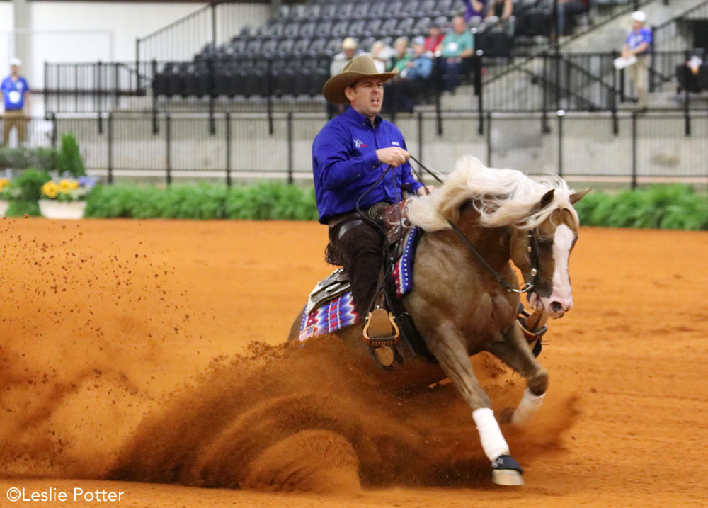 Jordan Larson and ARC Gunnabeabigstar competing in reining at the FEI World Equestrian Games Tryon 2018