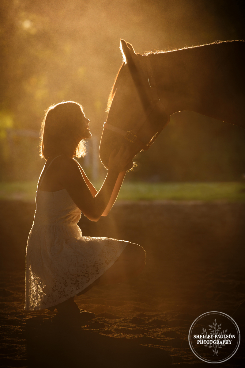 Silhouette of woman and horse by Shelley Paulson