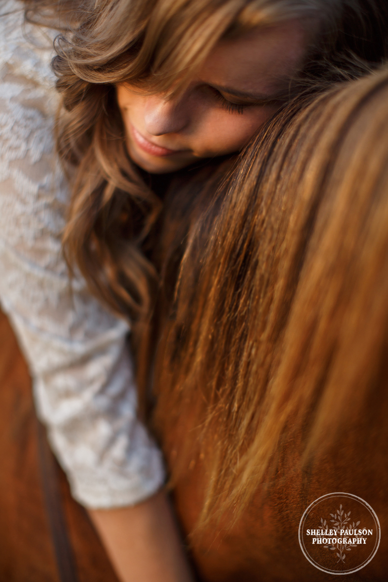 Closeup of woman and horse by Shelley Paulson