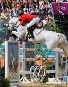 Three Americans will advance after day one of Olympic show jumping
