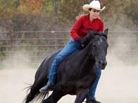 Stacy Westfall with her black American Quarter Horse