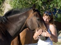 Enter your rescued horse in the ASPCA Home for the Holidays photo contest woman horse