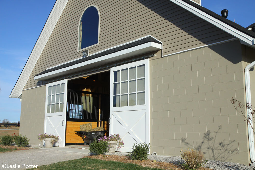 Front of a horse barn- barn cleaning hacks