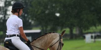 Riding a horse in the rain