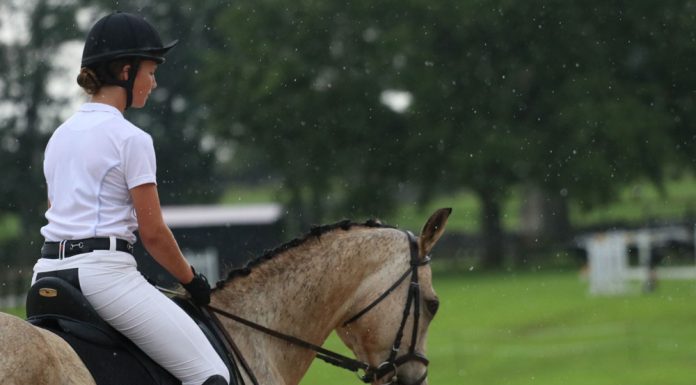 riding a horse in the rain