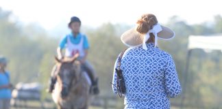 Mom and kid at a horse show