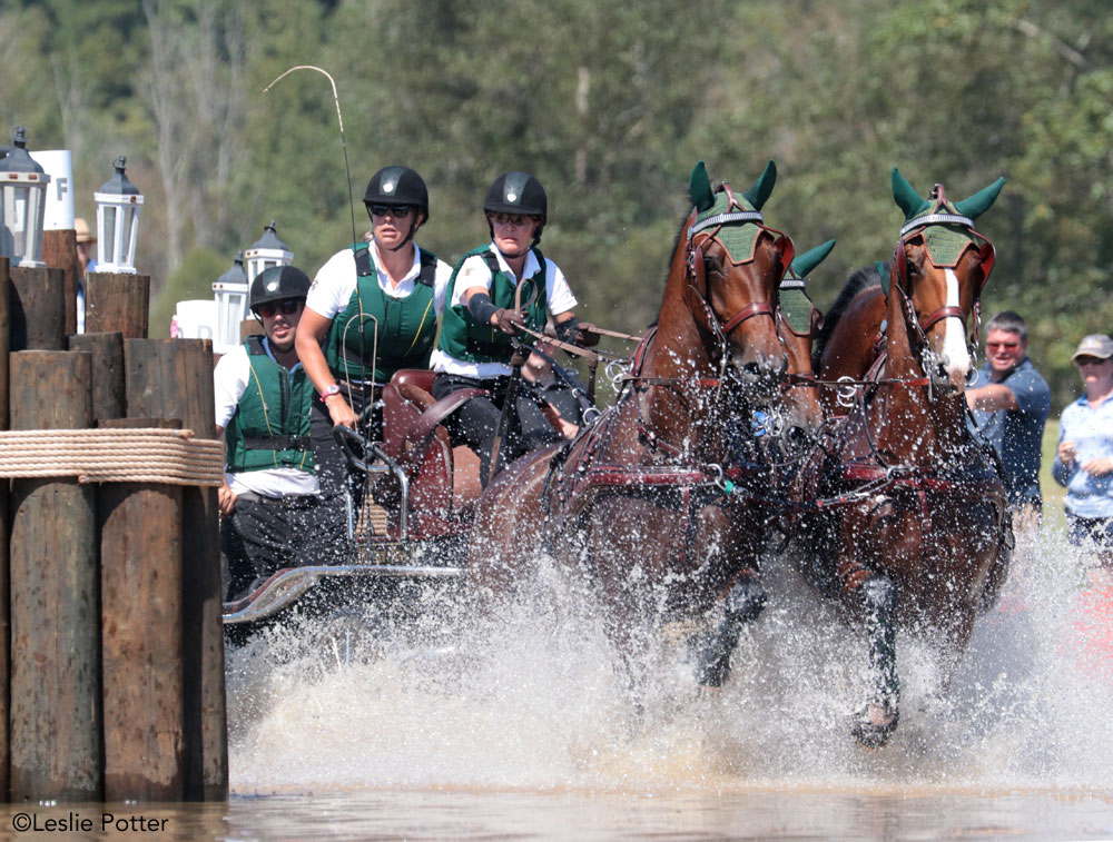 Misdee Wrigley-Miller drives through the Mars water complex on the WEG marathon course