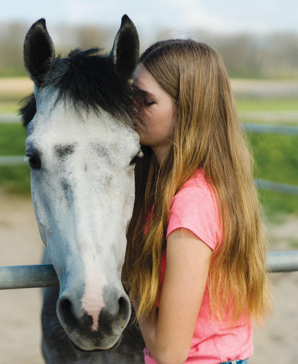 Girl with gray horse