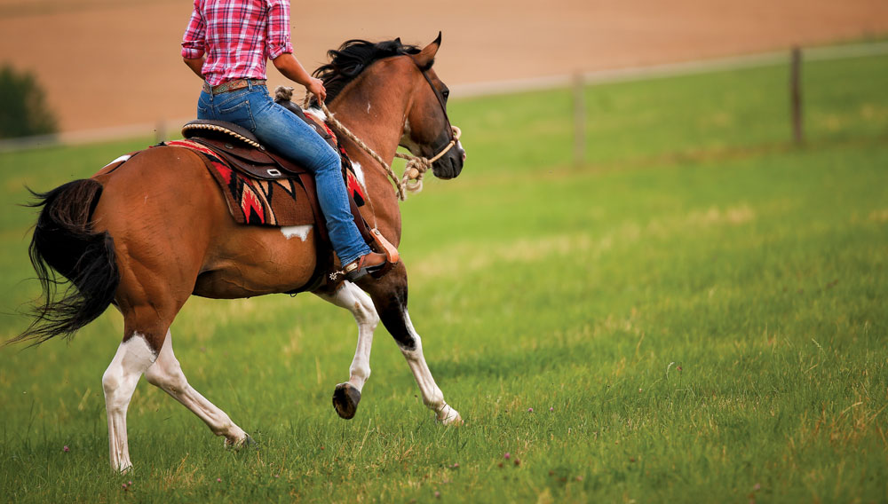 Western rider at a lope