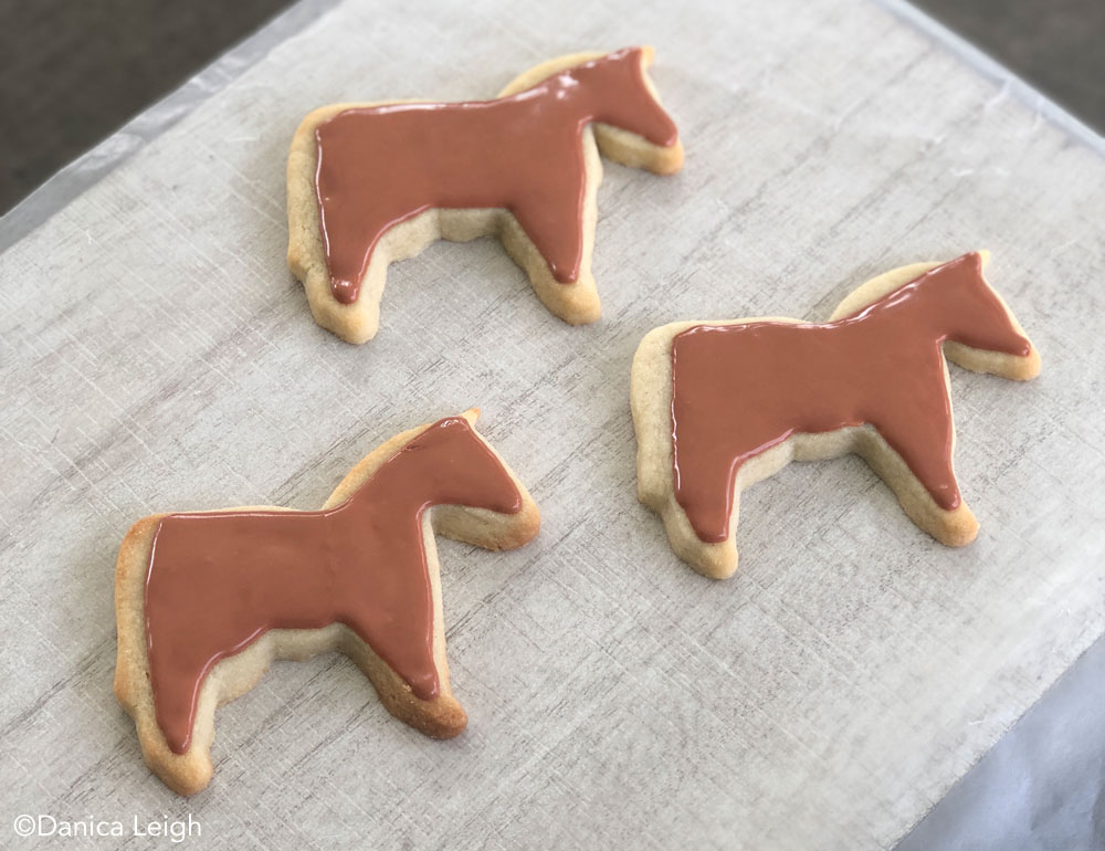 Frosted horse-shaped cookies