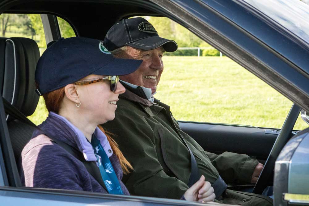 The author and Captain Mark Phillips tour the Land Rover cross-country course.