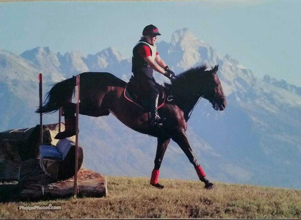 Karen and Sully jumping over a cross-country jump