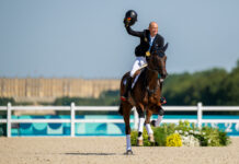 Michael Jung aboard Chipmunk FRH celebrates his history third individual gold medal in eventing