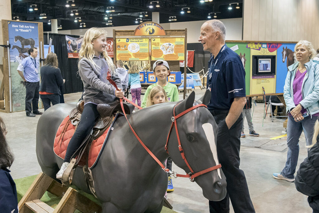 A child on a mock horse