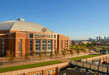 A front view of Dickies Arena in Fort Worth, Texas, with the skyline in the background, where the 2026 FEI Jumping World Cup Finals will take place.