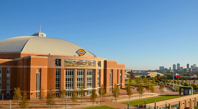 A front view of Dickies Arena in Fort Worth, Texas, with the skyline in the background, where the 2026 FEI Jumping World Cup Finals will take place.