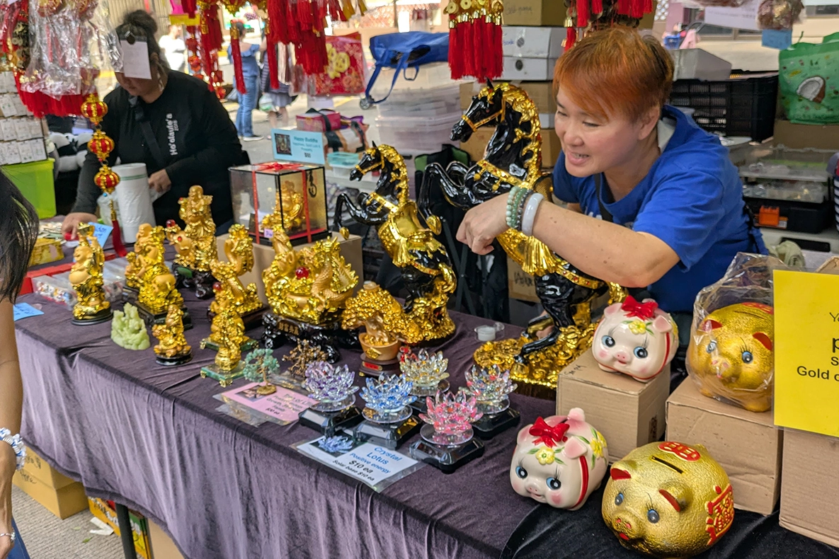 A merchant selling gifts at the 2026 Honolulu Spring Festival.