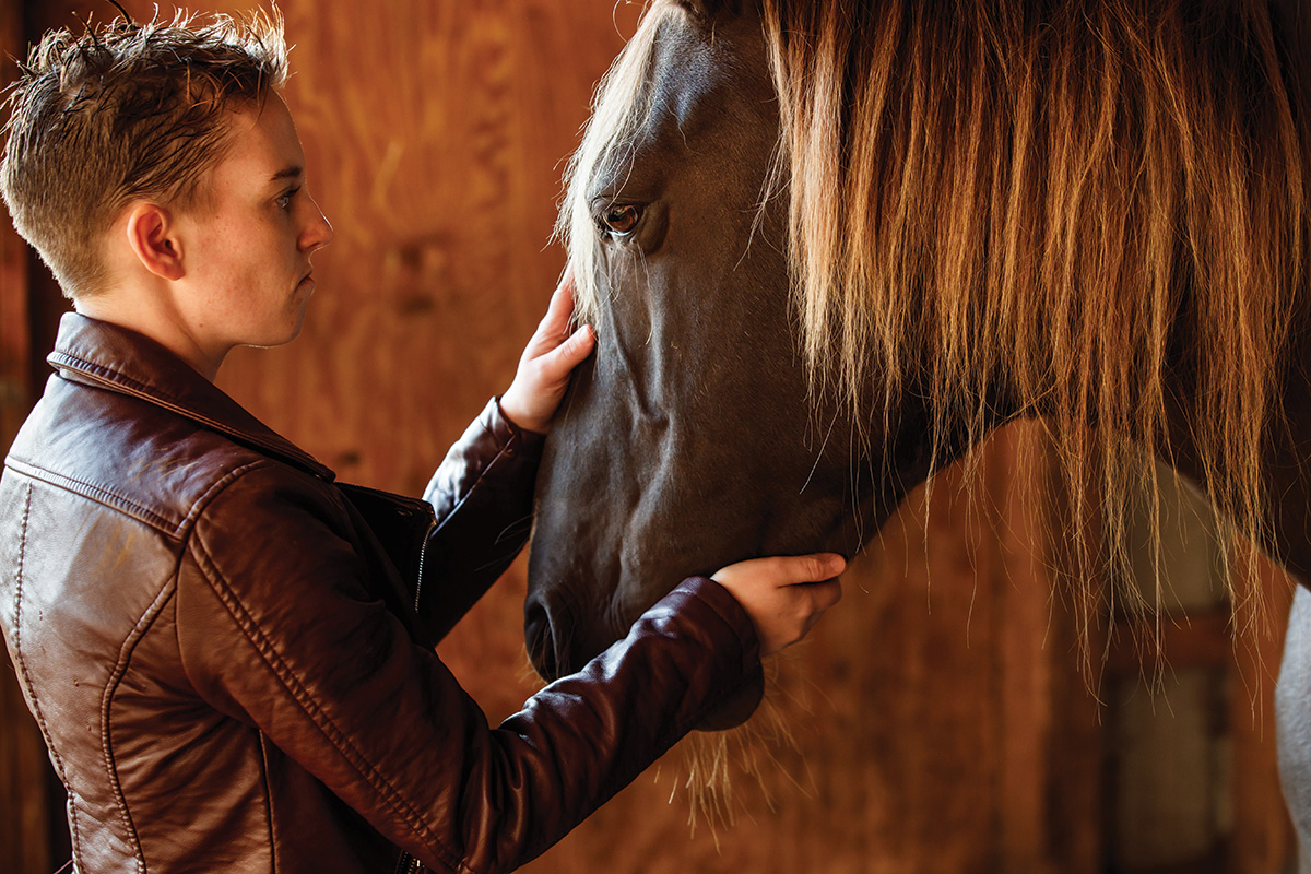 A victim of human trafficking heals via equine therapy at Angel Reins
