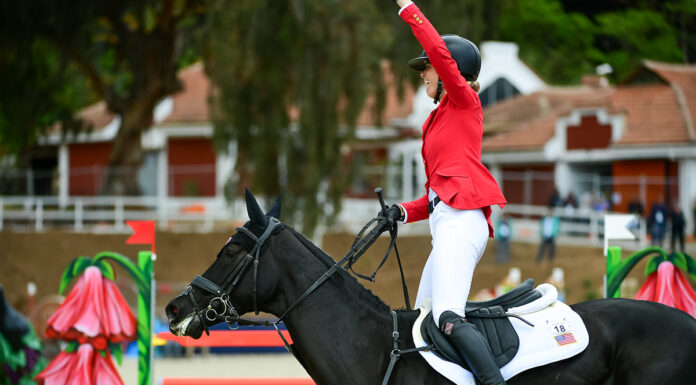 Caroline Pamukcu celebrates after her gold medal winning round at the 2023 Pan American Games