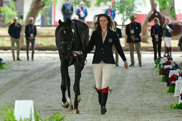 Caroline Pamukcu and HSH Blake jogging for the USA eventing team at the Pan American Games