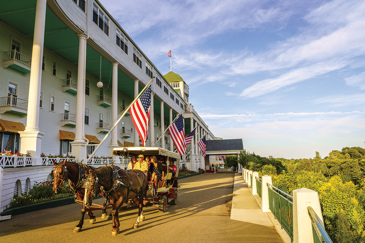 Carriage horses pass the Grand Hotel on Mackinac Island