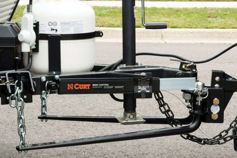 A weight distribution hitch on a horse trailer, which reduces trailer sway and redistributes the trailer tongue weight, in turn helping improve gas mileage