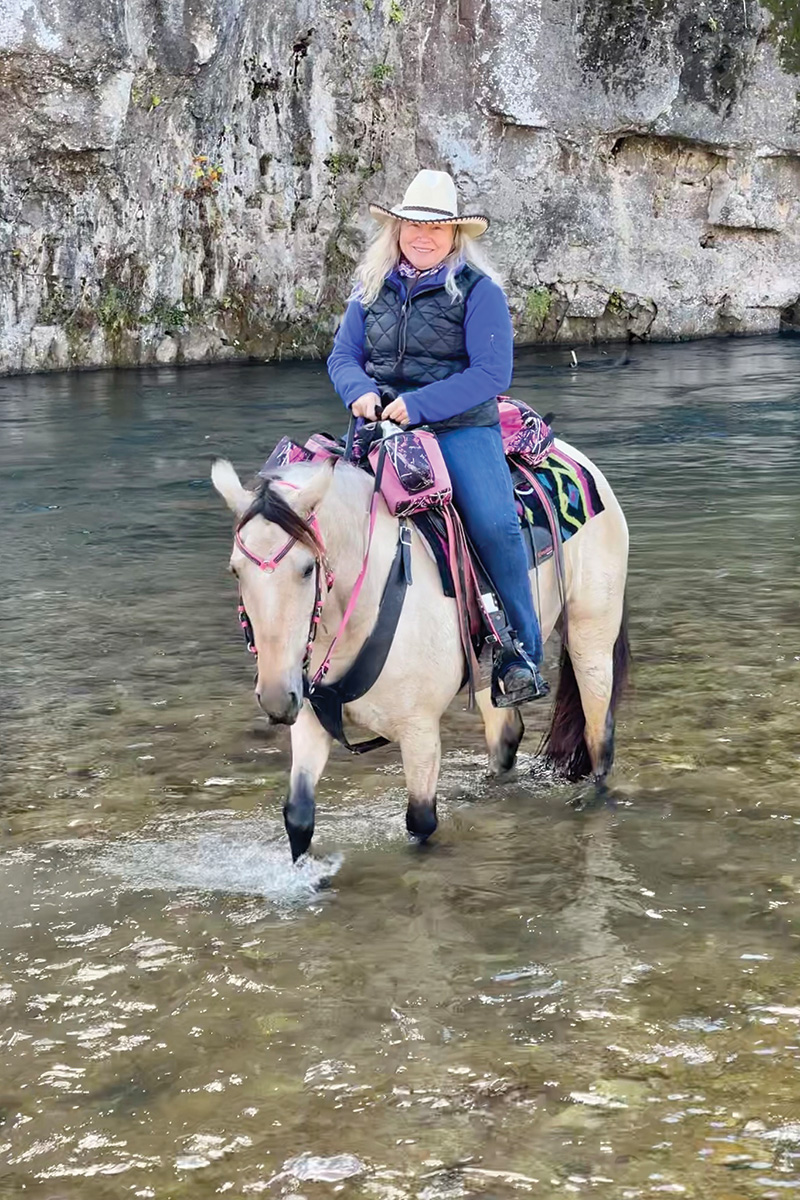 Glory Redmond and Via’s Sugarfoot in Missouri on a cross-country trail ride. 