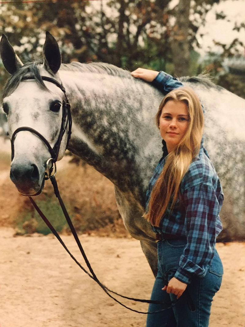 Ali as a teen with her horse.