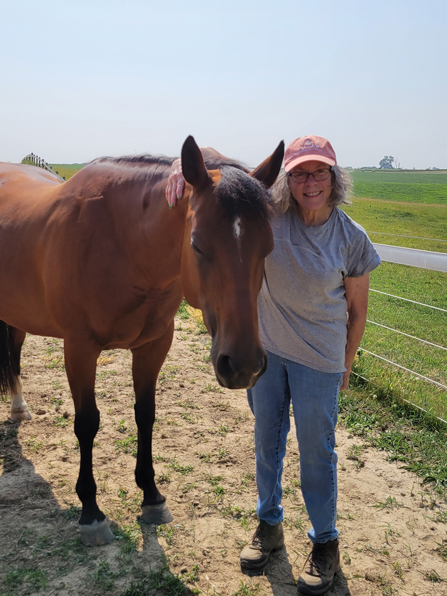 The author, Judy, with her mare Nellie.