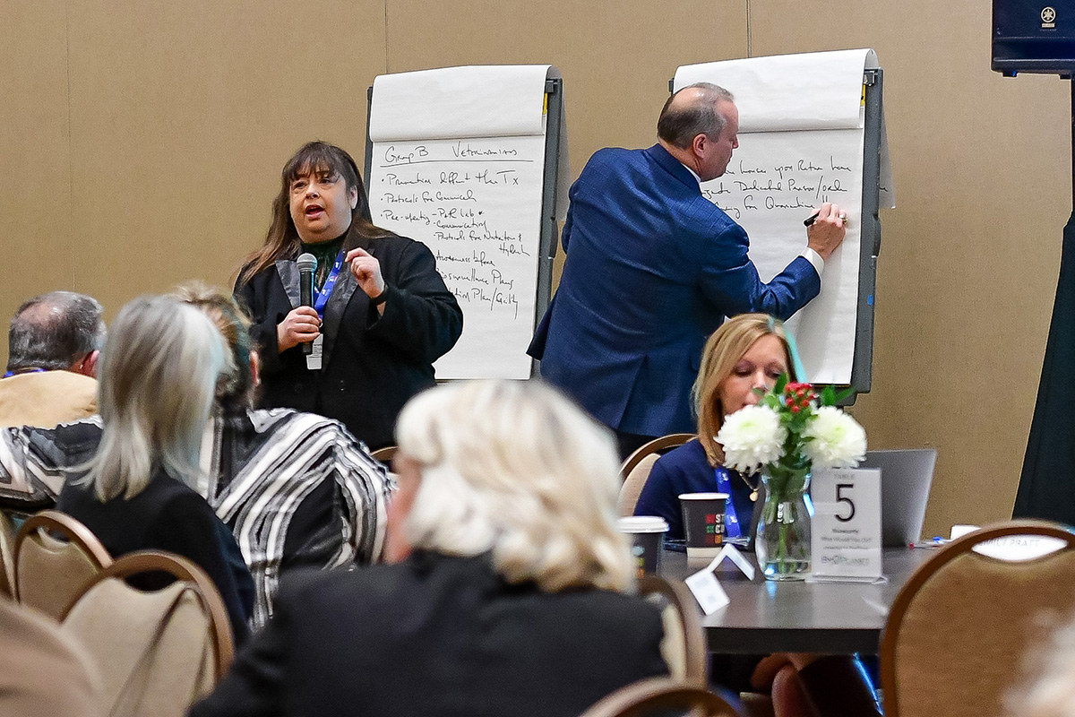 United States Equestrian Foundation Senior Veterinarian Dr. Katie Flynn answers questions during the 2024 convention