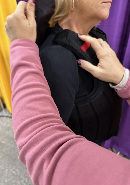 Making shoulder strap adjustments.