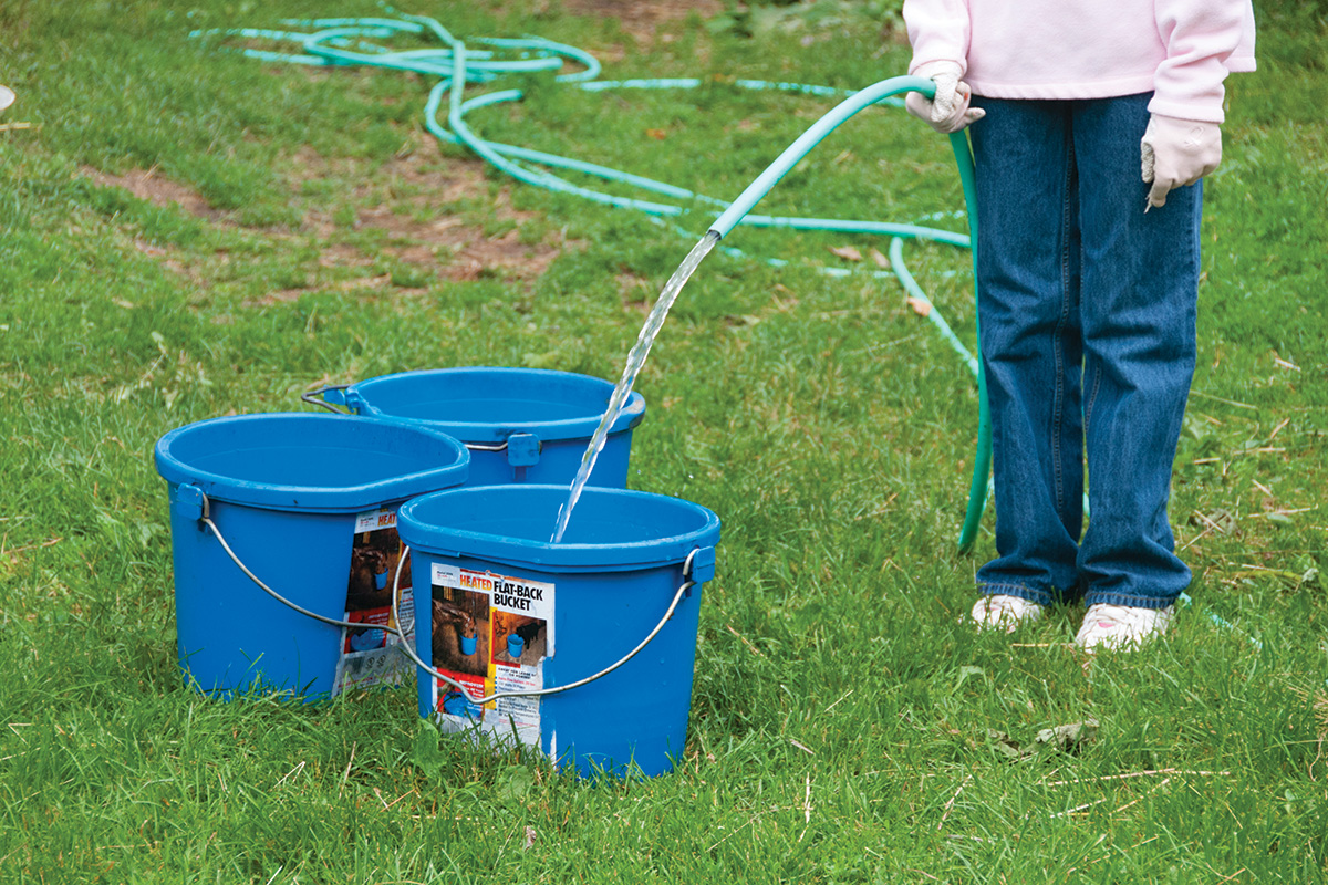 Water buckets being filled