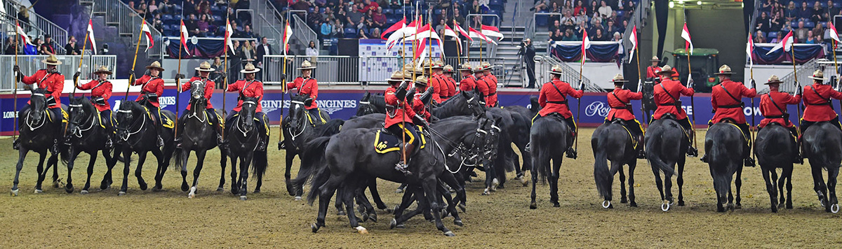 Mounties performing the windmill